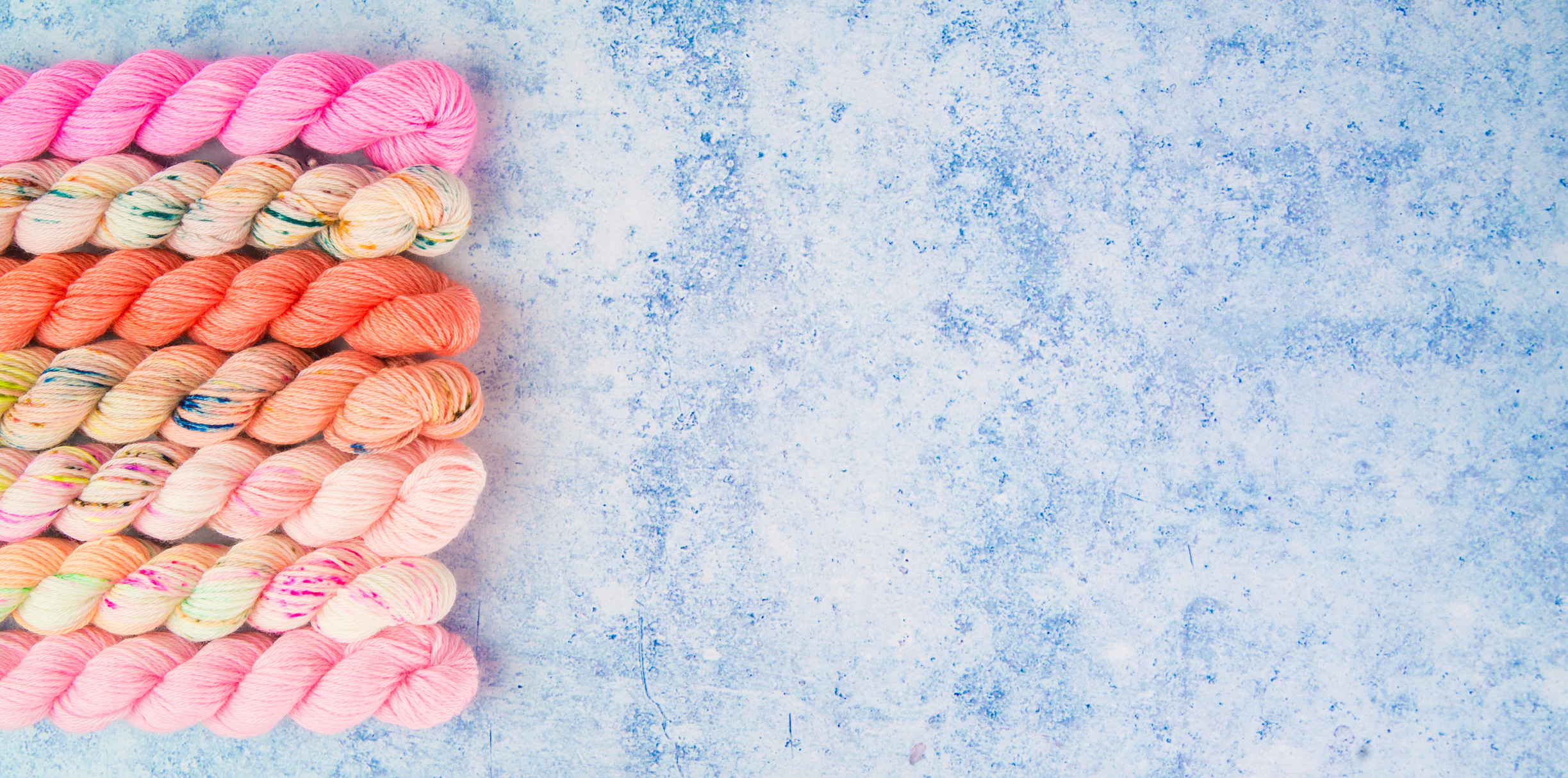 Yarns on Blue Background
